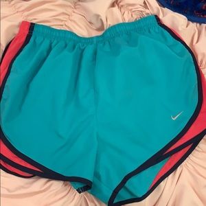 Blue and pink nike shorts